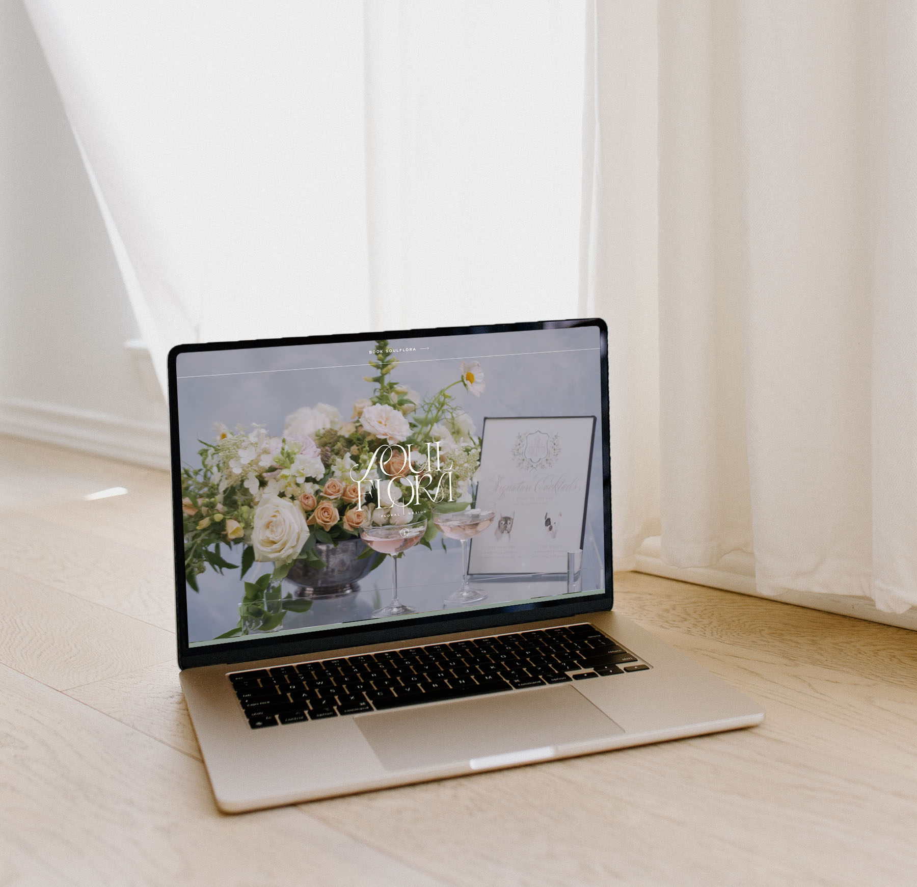 Laptop showing luxury florist Showit website design
