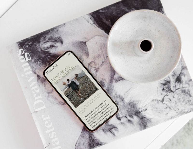 Mobile preview of Cascadia Showit website template styled on art book with ceramic dish.