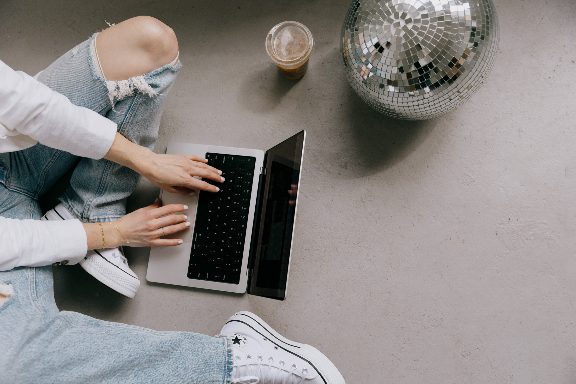 a Showit website designer typing what makes our Showit templates unique