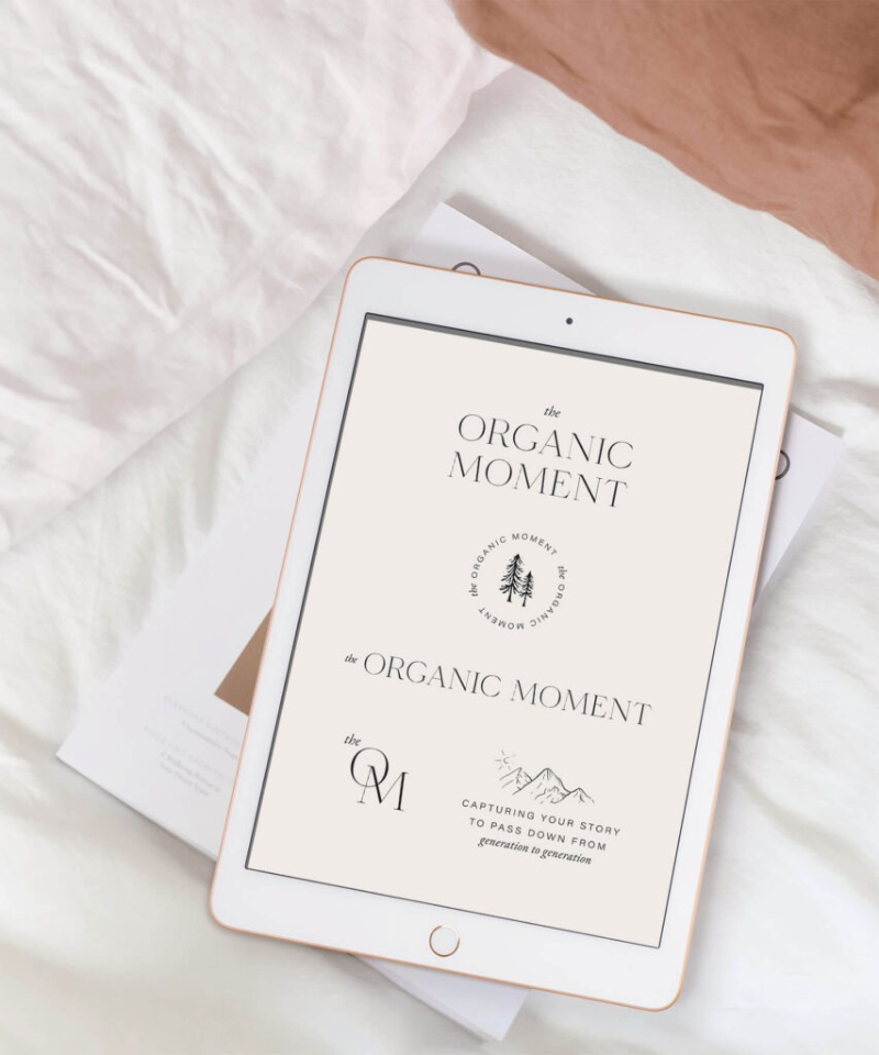 Tablet displaying brand design mockup for The Organic Moment, showcasing premium Showit templates for photographers.