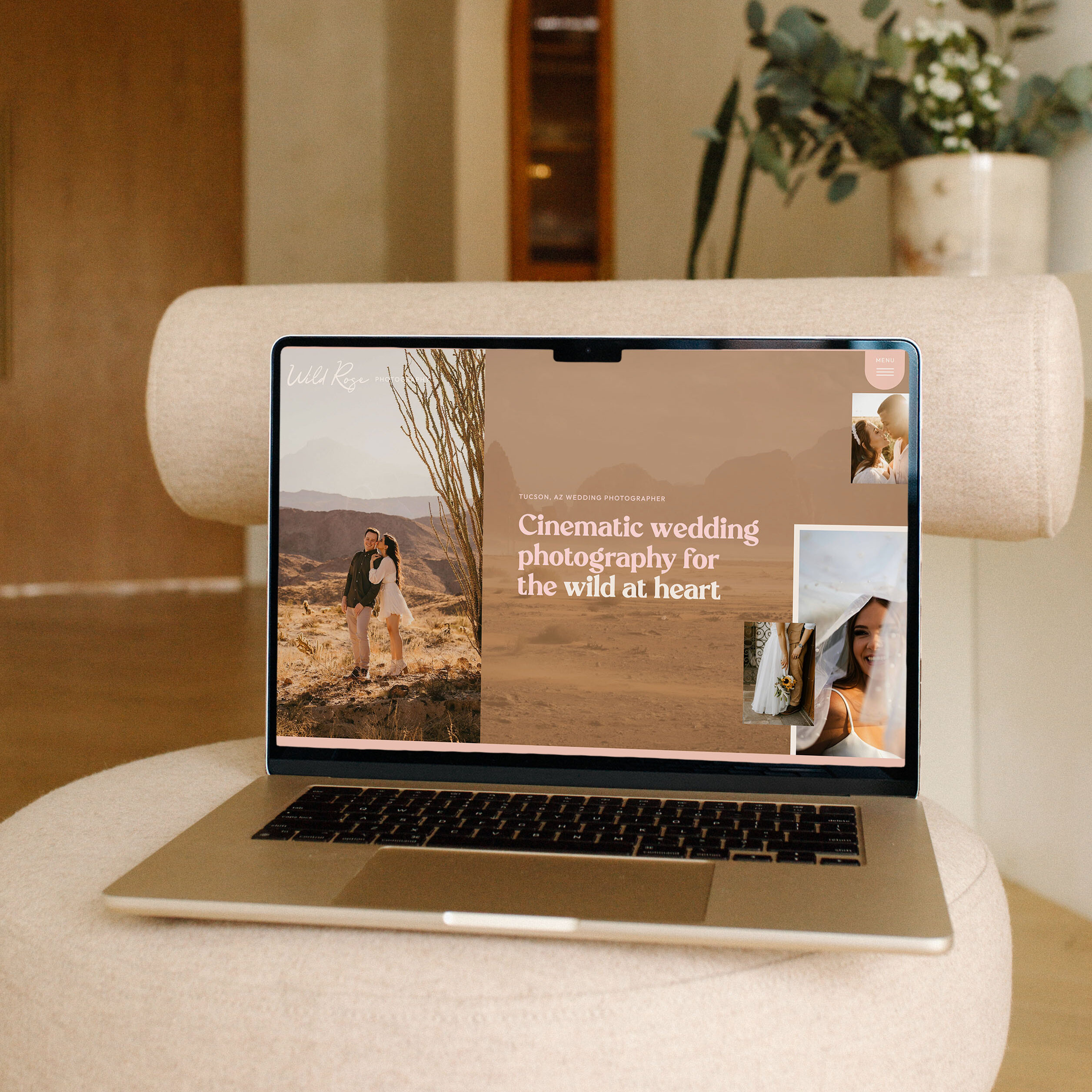 Laptop open on a chair showing a western Showit template for photographers